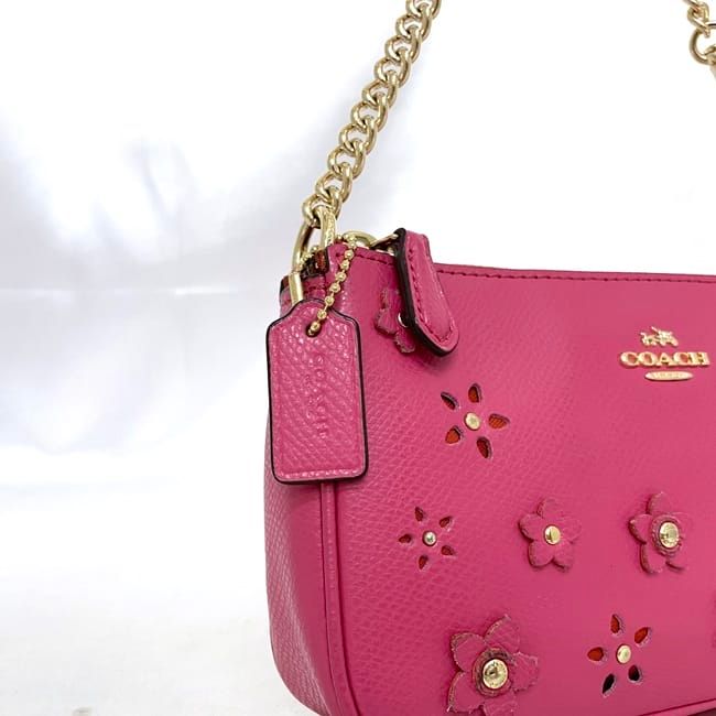 バッグ Coach Leather Pink Accessory Pouch Bag Coach Pink PVC Leather Accessory Pouch with Studs and Floral