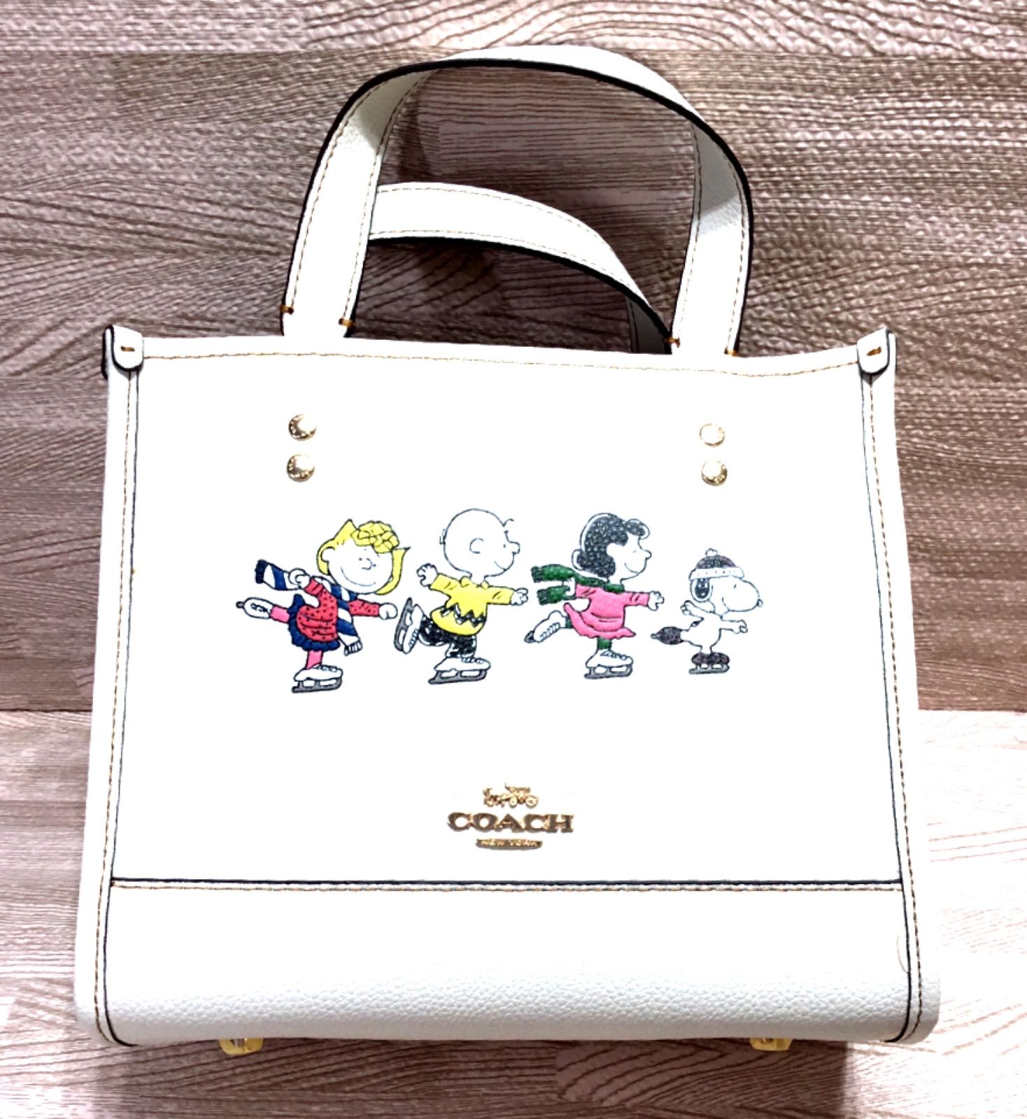 コーチ COACH COACH X PEANUTSトー22スヌーピアイススケート