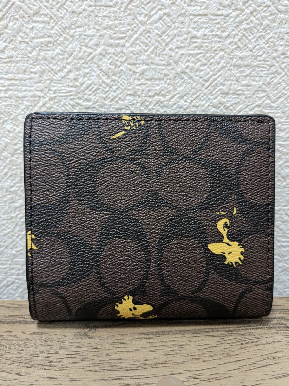 ☆新品未使用☆ COACH×PEANUTS ウッドストック 折りたたみ財布 - メルカリ