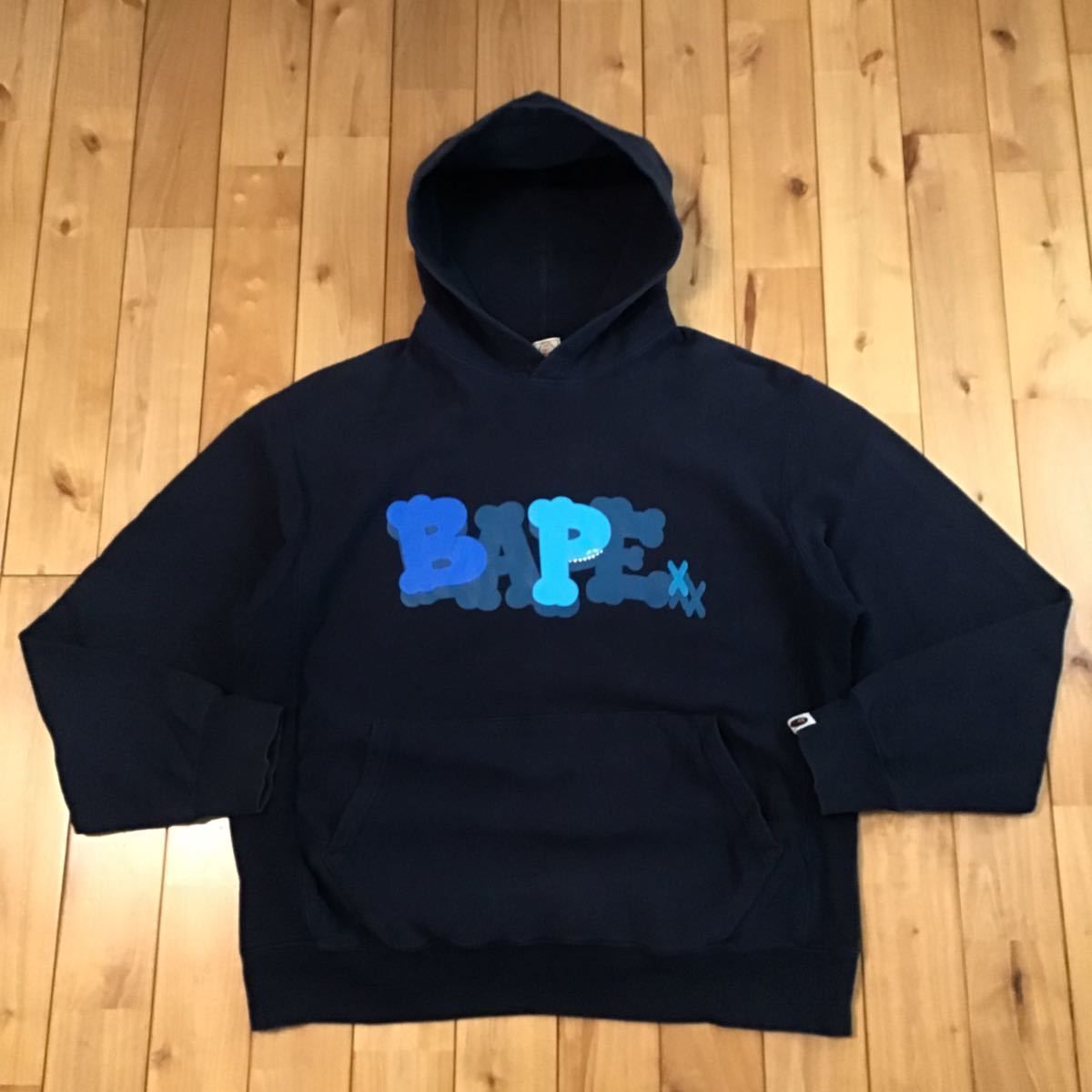 トップス希少!!激レア!!KAWS × BAPE パーカー Ｌ カウズ ベイプ エイプ