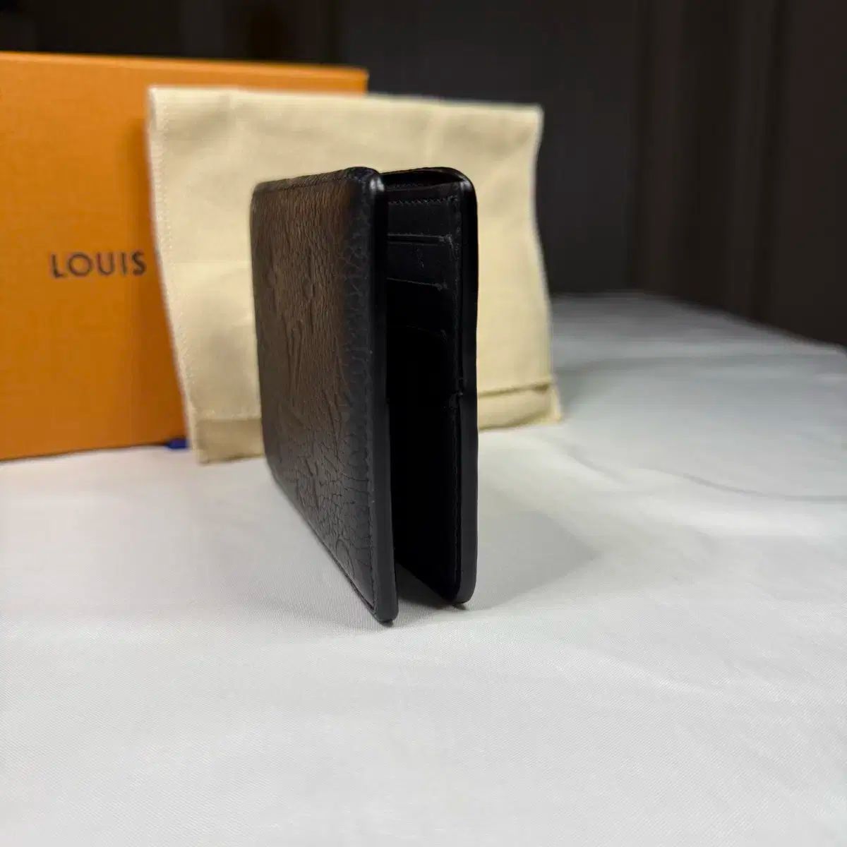 二つ折り財布 M69075