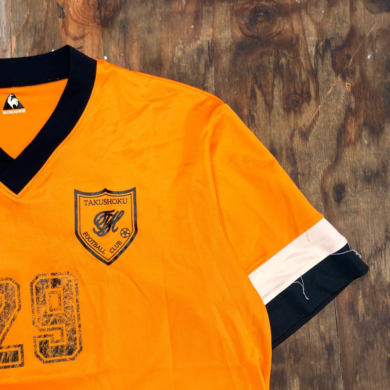 le coq sportif ルコックスポルティフ ゲームシャツ Vネック オレンジ