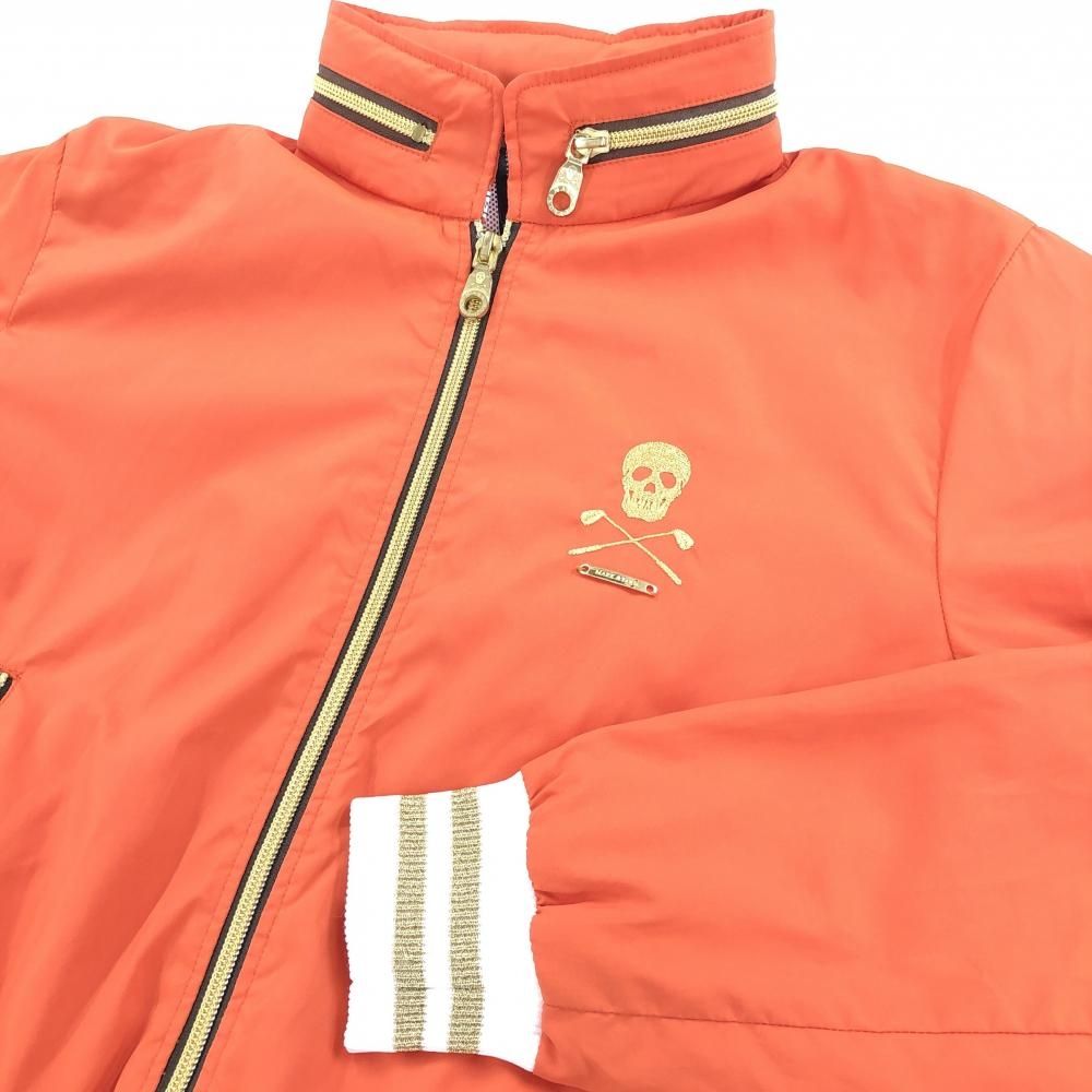 超 マークアンドロナ ジャケット オレンジ 裾ロゴ スカル メッシュ裏地 フード収納可 レディース ゴルフウェア MARK＆LONA WHITEMONARCHHOTEL_COM