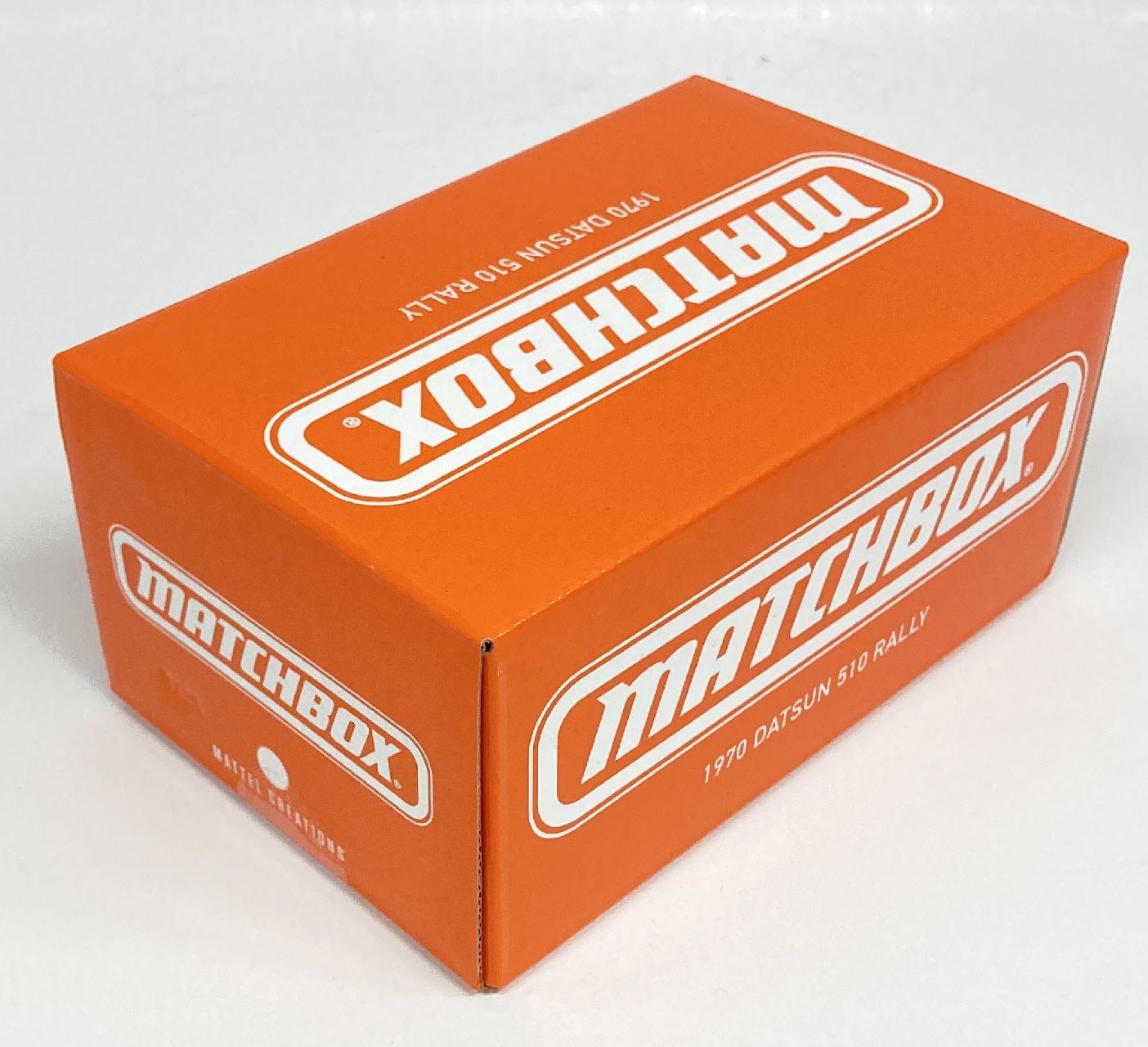 MATCHBOX 1/64 COLLECTORS 1970 Datsun 510 Rally BLACK/ORANGE