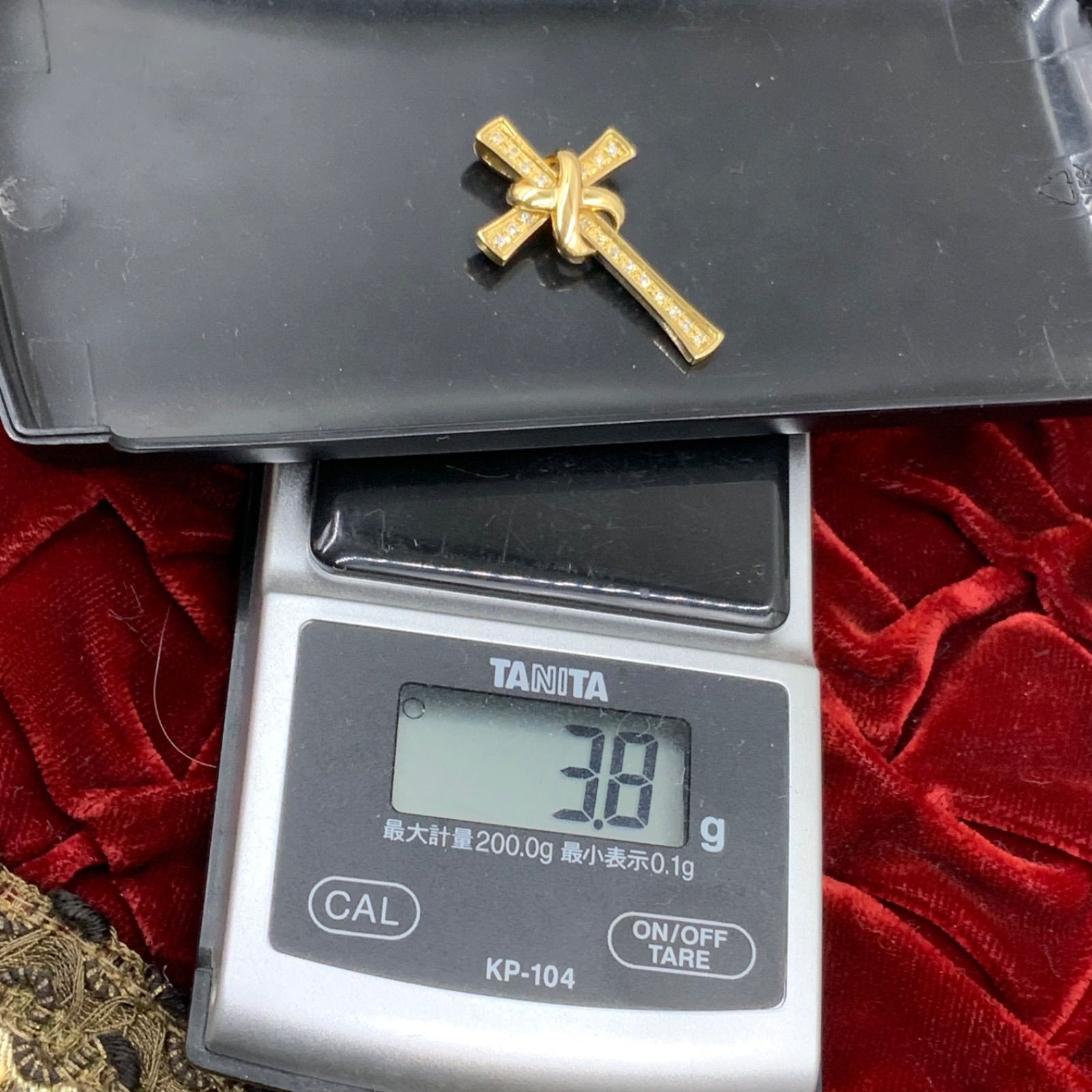 K18 ダイヤ クロス ペンダント 3.8g 0.23ct - メルカリ