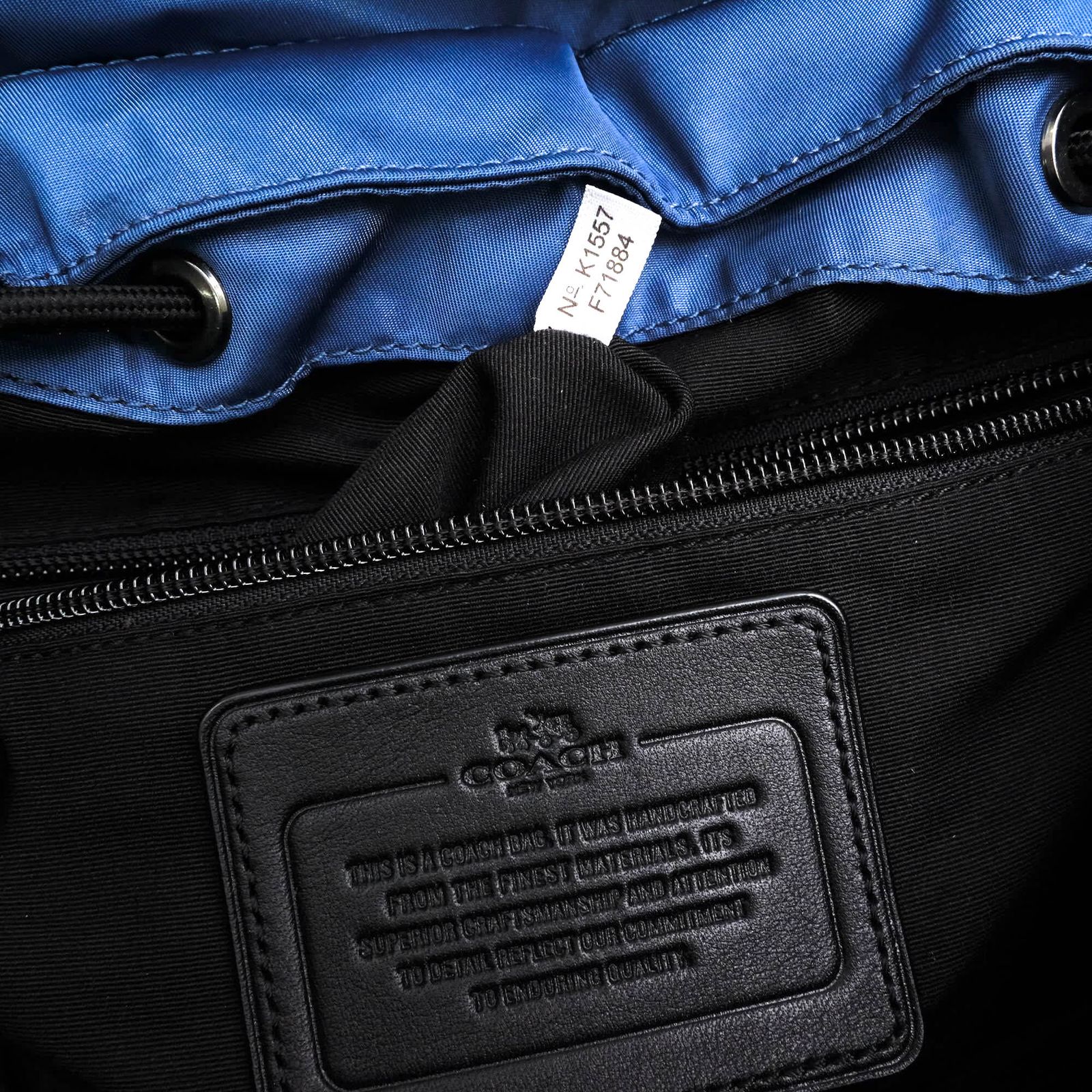 Coach ネイビー レザーバックパック フロントポケット付き Coach ネイビー レザーバックパック フロントポケット付き コーチの