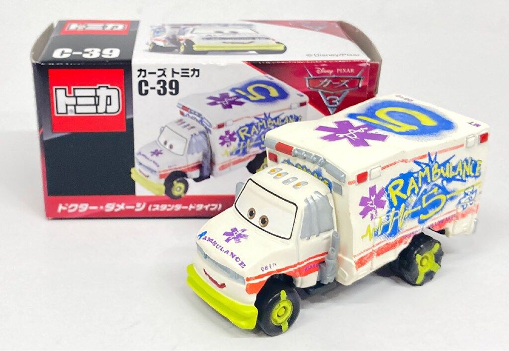 新品未開封 カーズ トミカ C－39 ドクター・ダメージ　スタンダードタイプ Amazon.co.jp: ディズニー カーズ トミカ C-39 ドクター