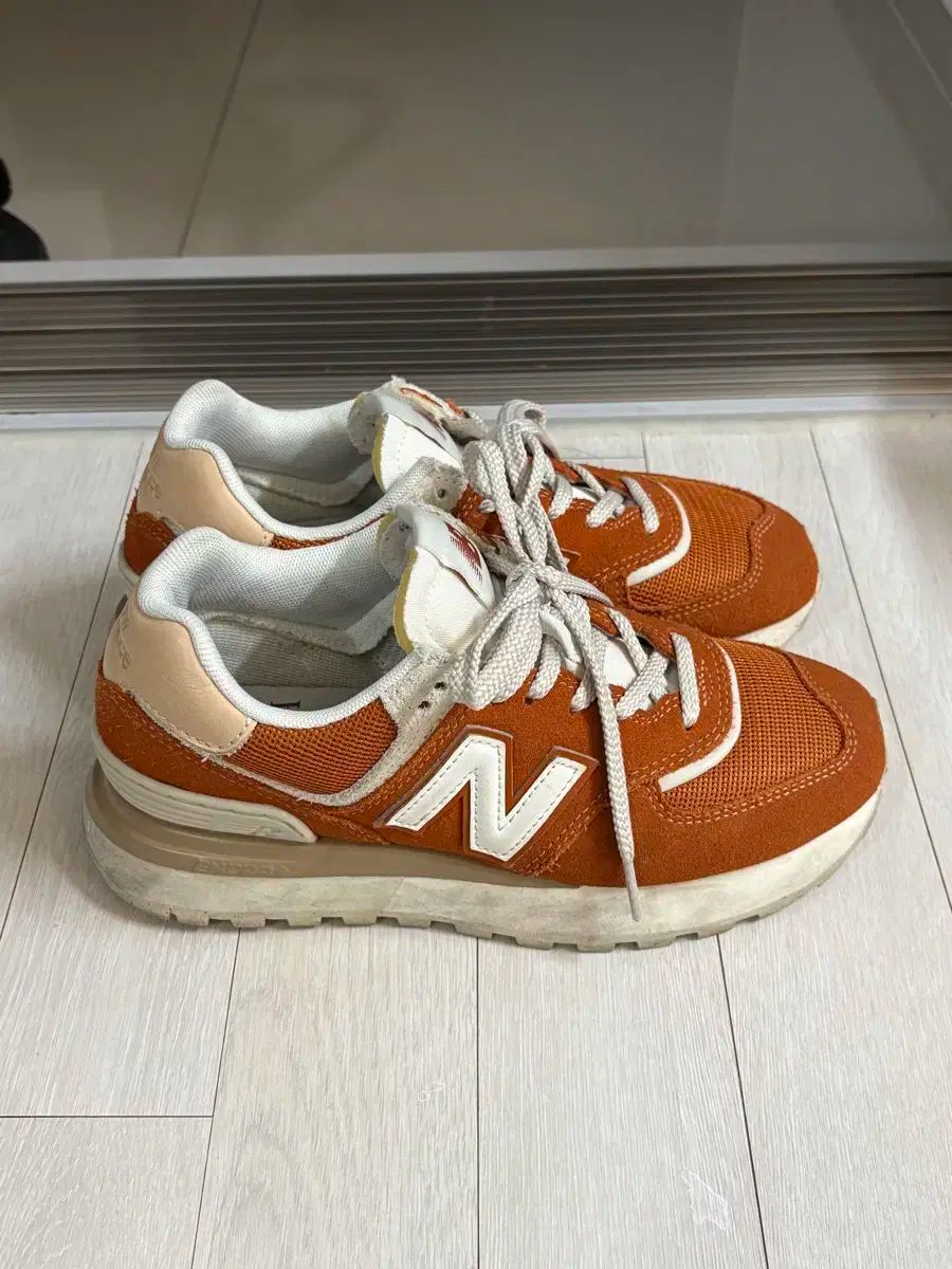New Balance(ニューバランス) 574 レガシー オレンジ U574LGDO 225