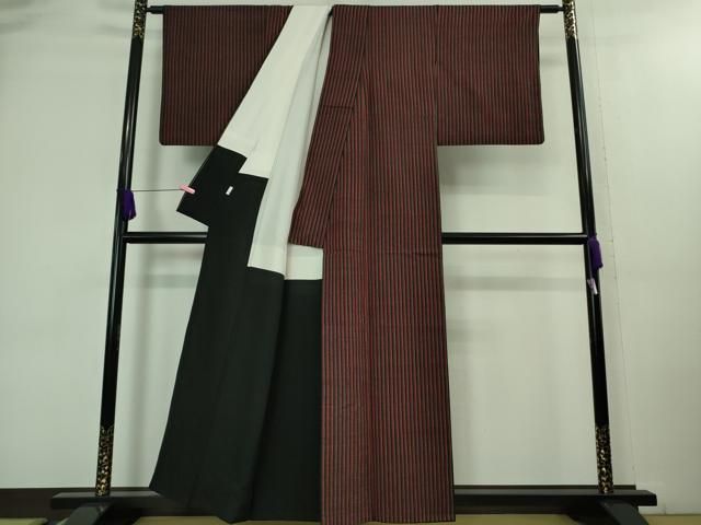 平和屋着物○本場結城紬 重要無形文化財 100亀甲 飛び亀甲柄 風景文