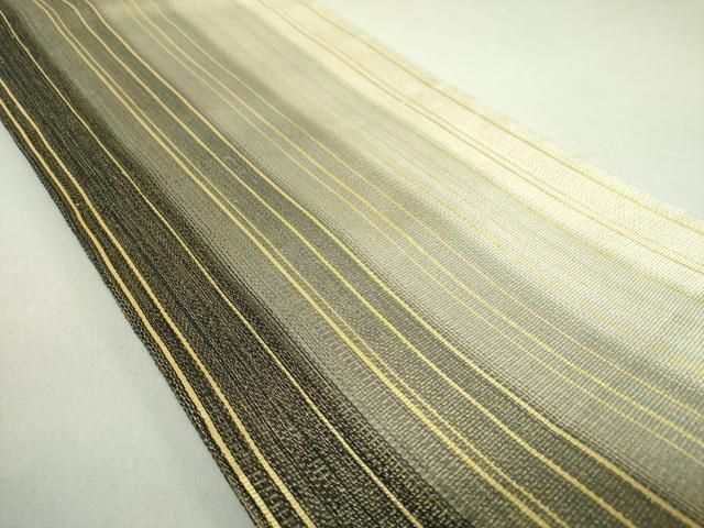 平和屋着物○ひなや工房 くむ・あむ・おる 伊豆蔵明彦 全通柄袋帯 間道