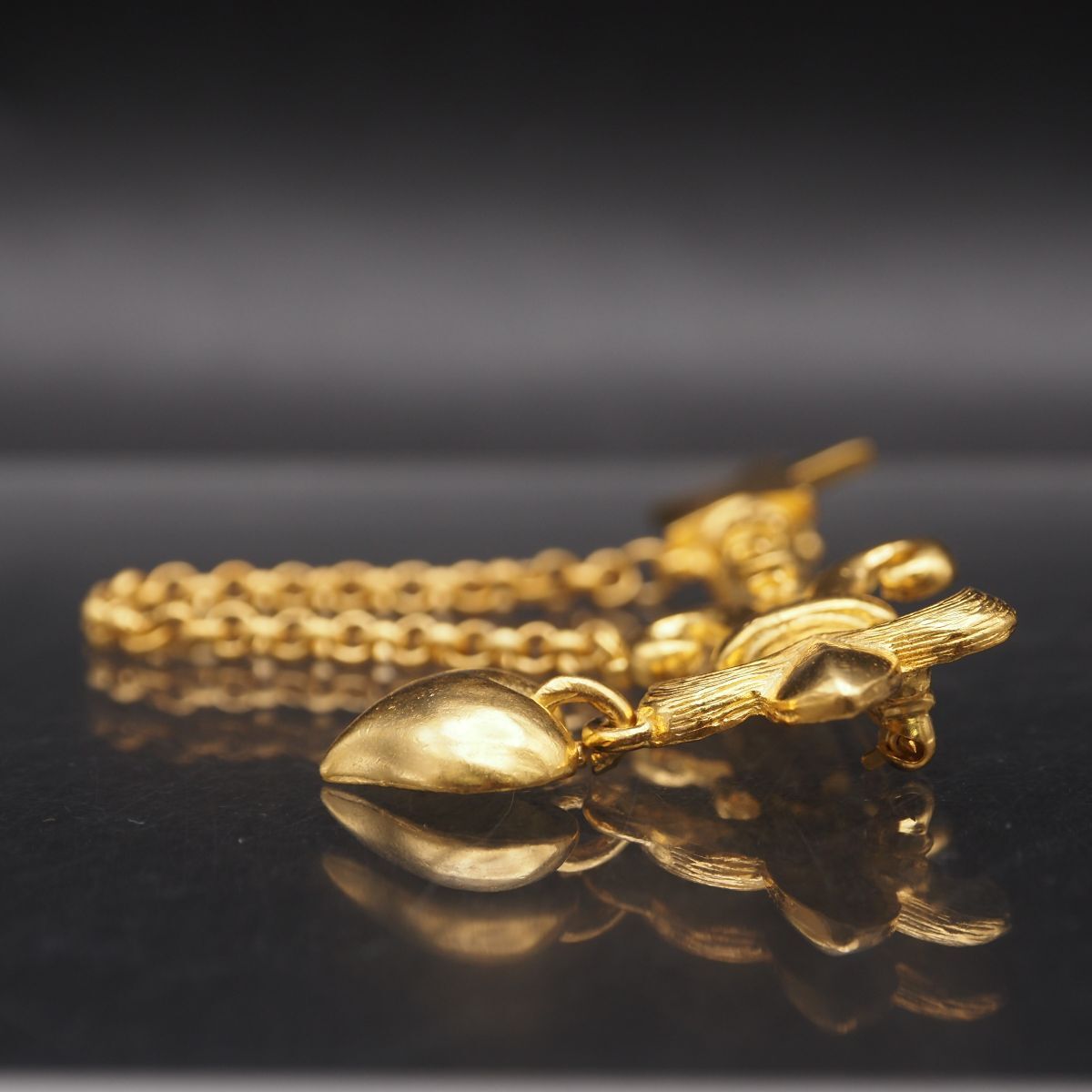 C399 TWINKLE TOKYO イヤリング ゴールド デザイン スリーフェイク