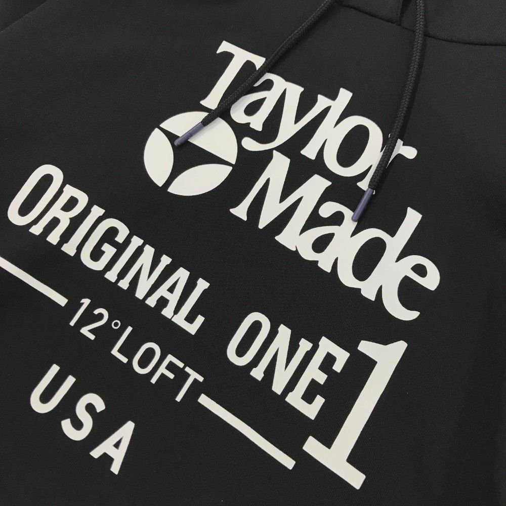 サイズ：O TAYLOR MADE テーラーメイド  スウェット 長袖パーカー  ブラック系 [240101394034] ゴルフウェア メンズ ストスト サイズ：O TAYLOR MADE テーラーメイド スウェット 長袖パーカー
