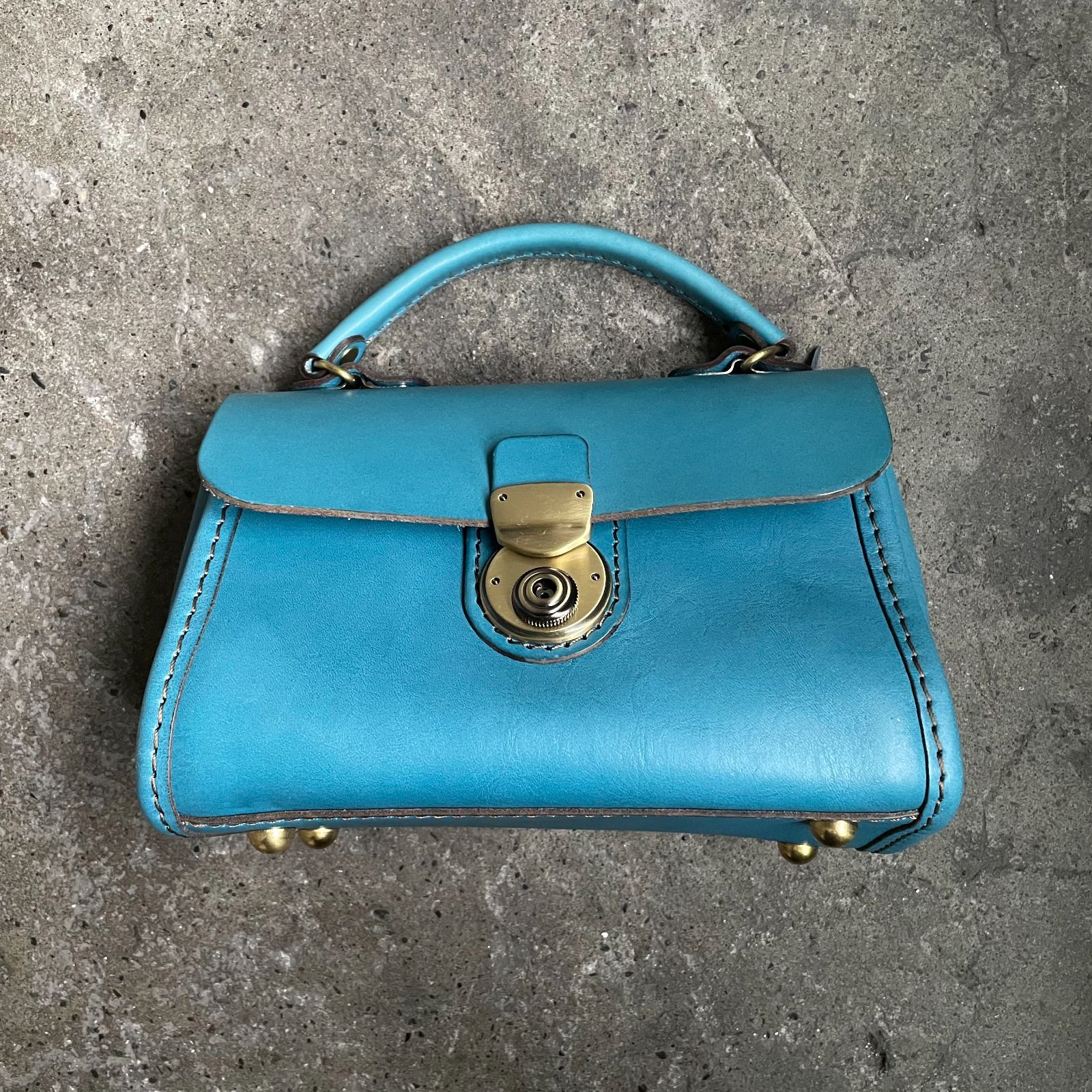 HERZ 2025春夏限定色 プチミニョン セルリアンブルー ハンドバッグ