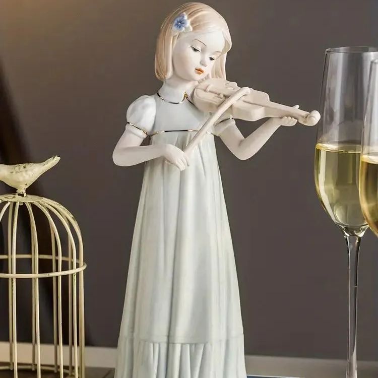 セラミック製のバイオリンを弾く少女の像 セラミック製 ヴァイオリン