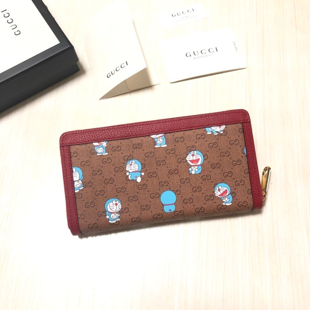 ドラえもん×グッチ プリント フラップ長財布 水色 GUCCI