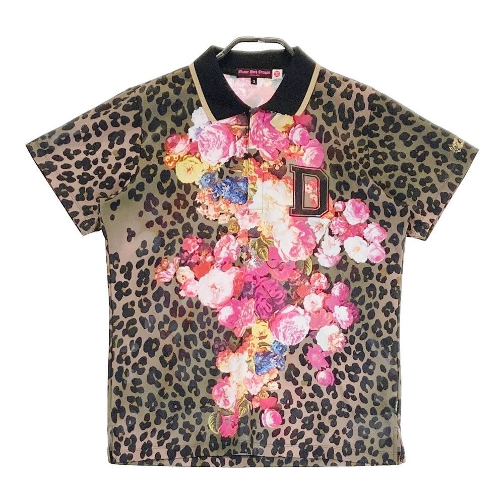 サイズ：3 DANCE WITH DRAGON ダンスウィズドラゴン  ハーフジップ 半袖ポロシャツ 総柄 ブラウン系 [240101375616]# ゴルフウェア レディース ストスト