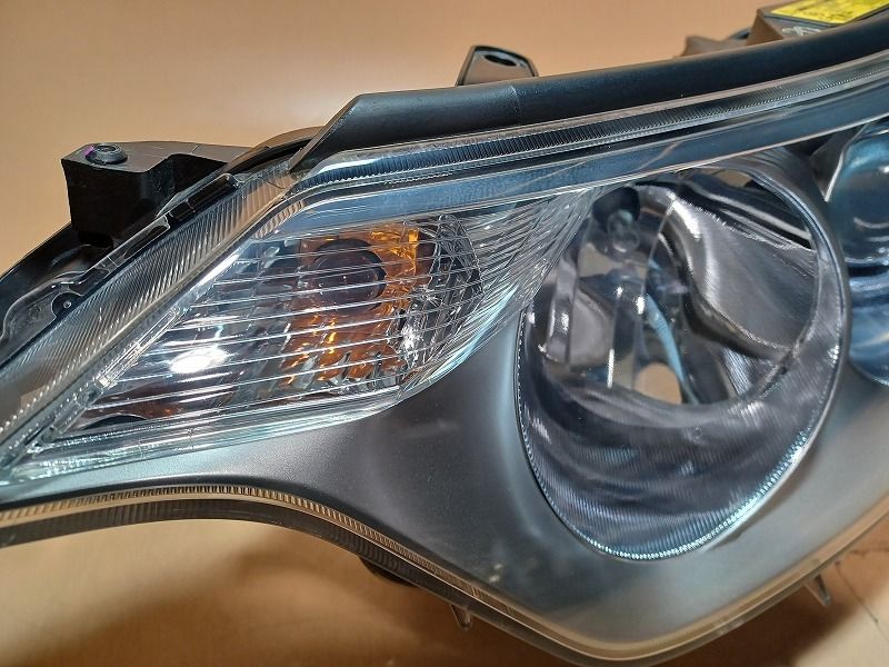 コーティング済 エスティマ AHR20W 左ヘッドランプ・ヘッドライト X  