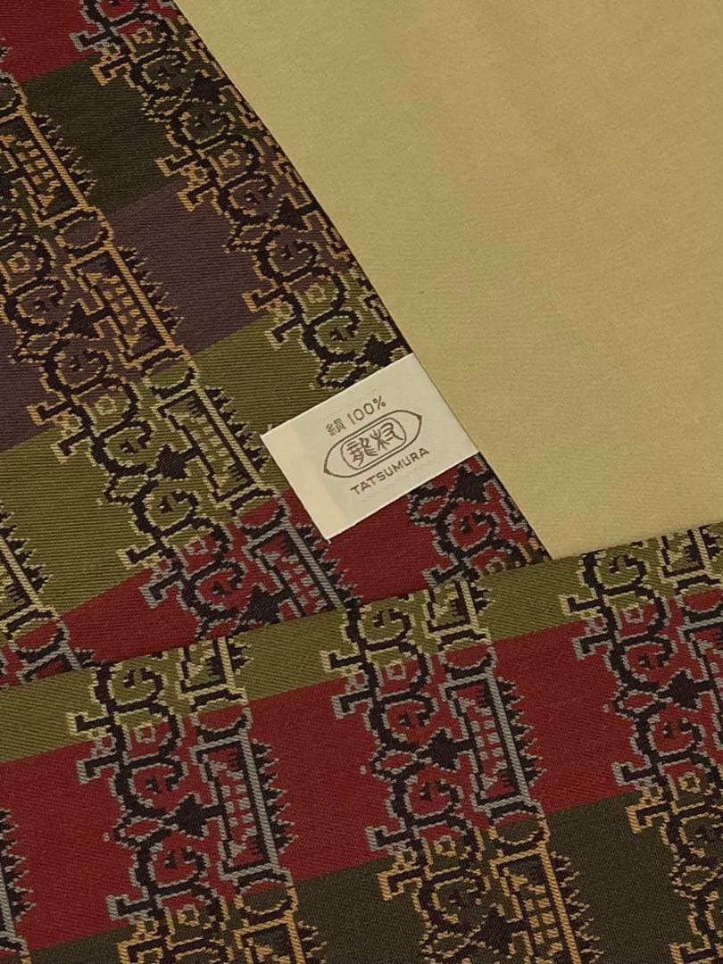 龍村美術織物　たつむら　九寸　開き名古屋帯　獅噛文長斑錦　金糸　正絹 龍村美術織物 獅噛文長斑錦 九寸名古屋帯 開き名古屋 正絹 Q900 - メルカリ