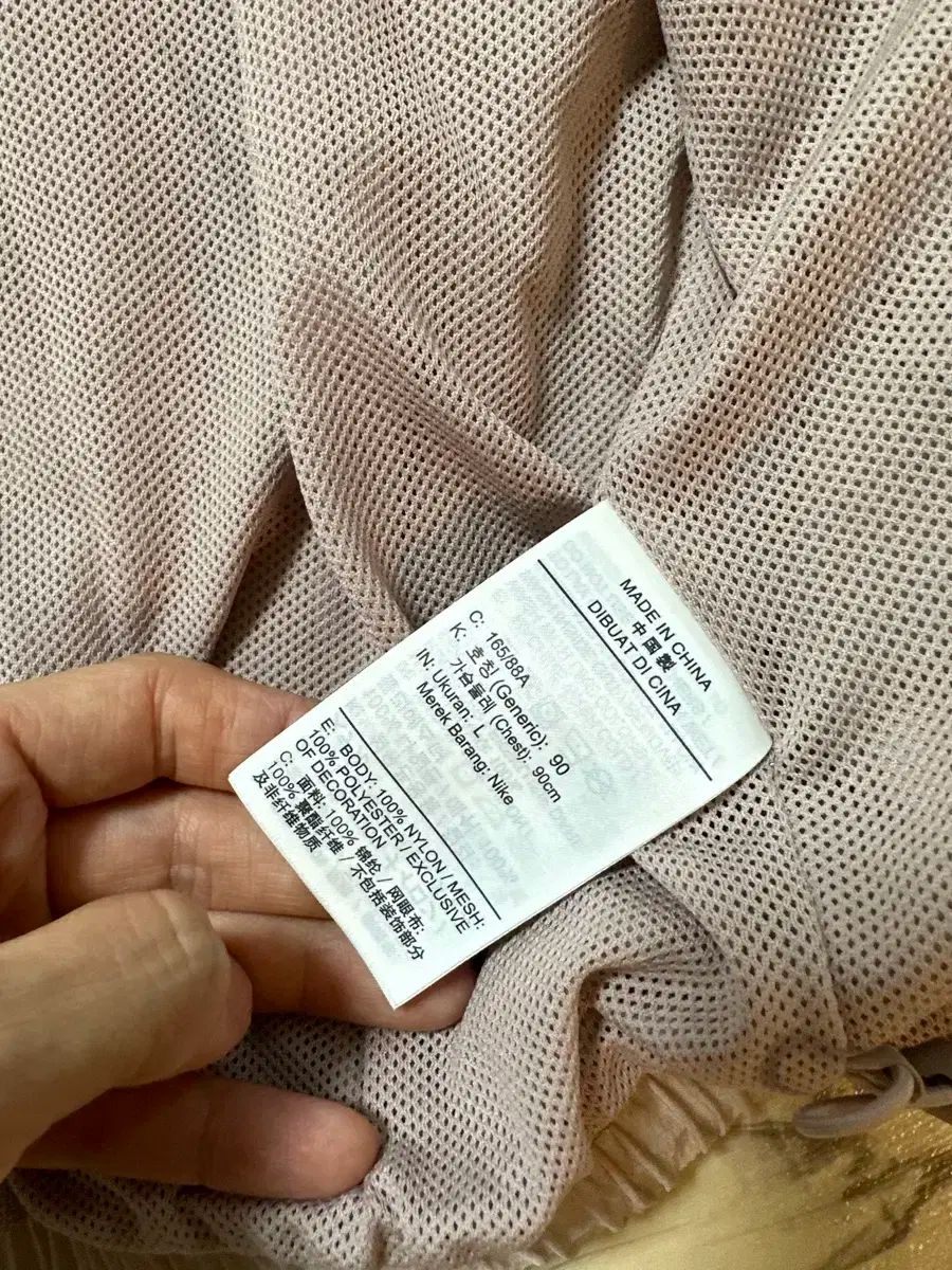 スウッシュ ウィンドブレーカー