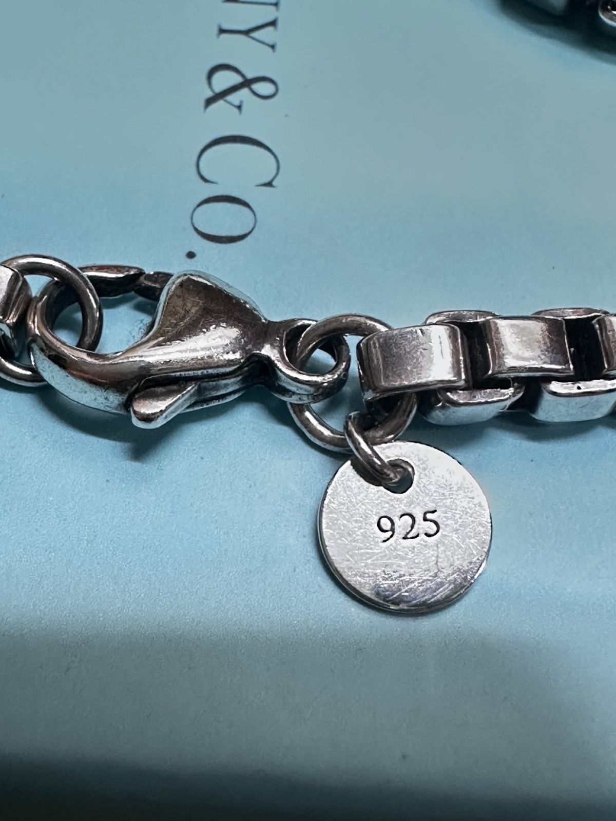 ティファニー シルバー ペンダントトップ ブレスレットチャーム　タグ ラウンド オールドティファニー TIFFANY&Co. ティファニー ほぼ新品