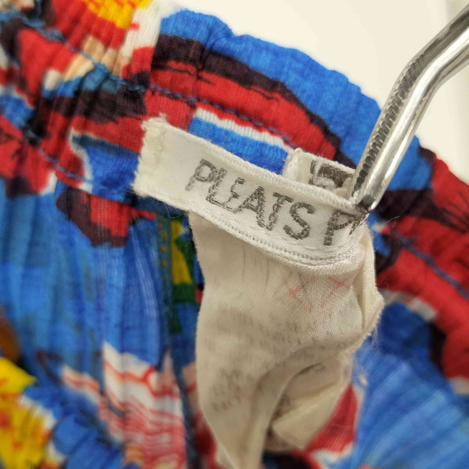 PLEATS PLEASE
