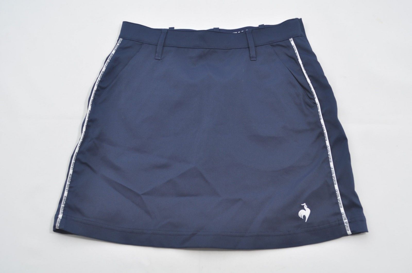 le coq sportif - coco 中古 ルコックスポルティフ le coq sportif レディース スカート 7号 紺 ネイビー   2022モデル  シンプル le coq sportif - ルコックスポルティフ ゴルフ スカート