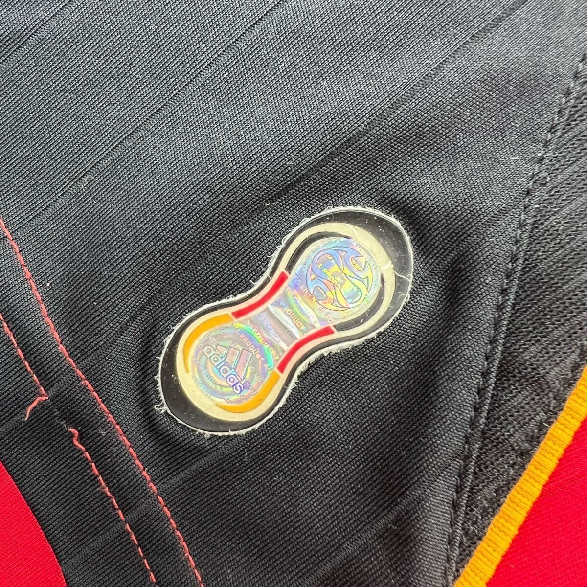 夏のセール開催中！ adidas アディダス ドイツ代表 アウェイ ユニフォーム ゲームシャツ レッド L相当 メンズ サッカー チーム タウンユース 人気 古着 AE354