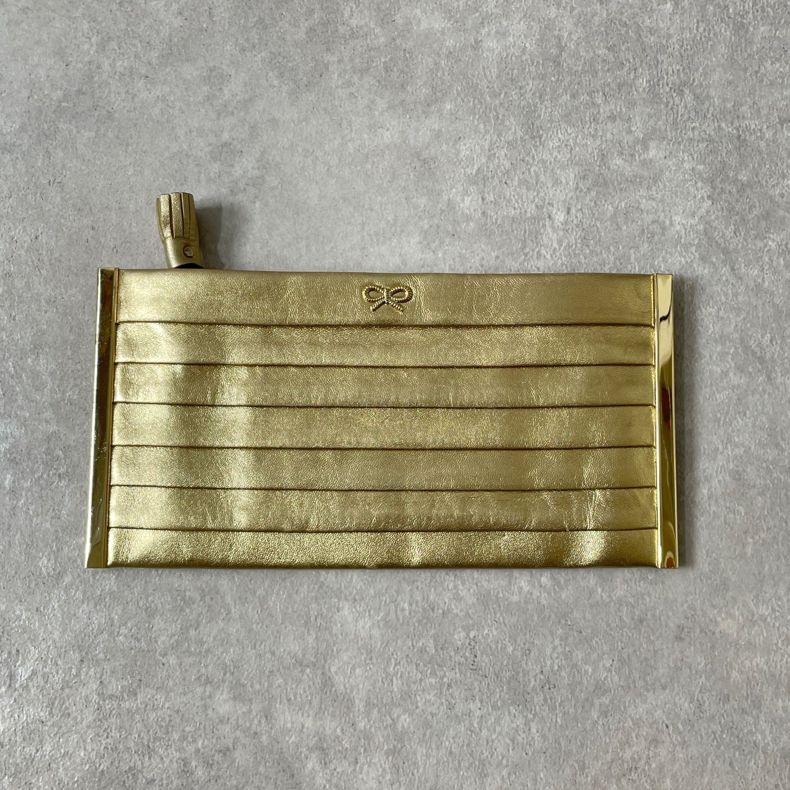 ANYA HINDMARCH タッセル リボン ポーチ アニヤハインドマーチ