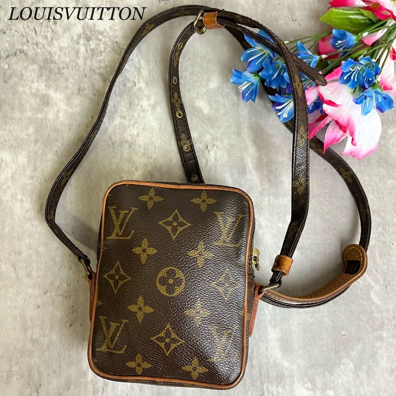 ✨希少品✨ LOUISVUITTON ルイヴィトン ポシェット ショルダーバッグ モノグラム ミニダヌーブ 総柄 ロゴ型押し ゴールド金具 シリアル  肩掛け 斜め掛け PVCレザー ヌメ革 ユニセックス レディース メンズ ブラウン 茶色 - メルカリ