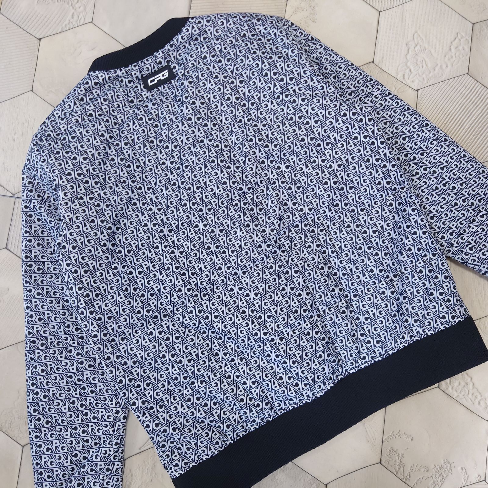 ♥ CPG GOLF 中綿プルオーバー スニード 総柄 総ロゴ ネイビー