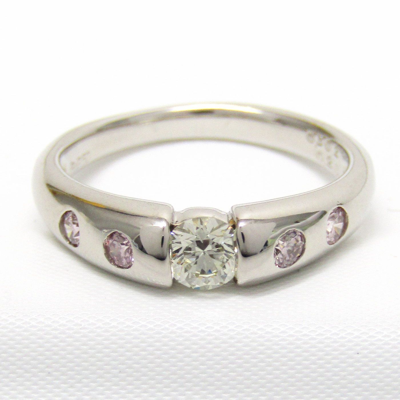 Uses high quality platinum diamonds and pink diamonds! design ring!