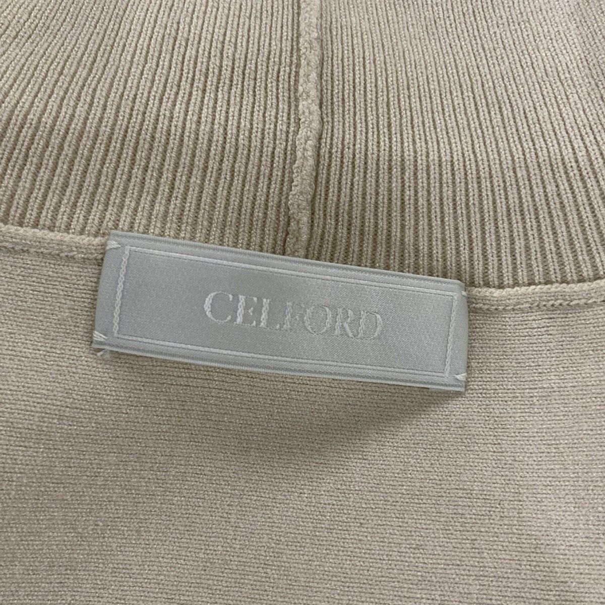  セルフォード レディースパンツセットアップ レディース - ライトベージュ ハイネック トップスポンチョ風 変形デザイン ウエストゴム パンツスーツ上下 ビジネススーツ