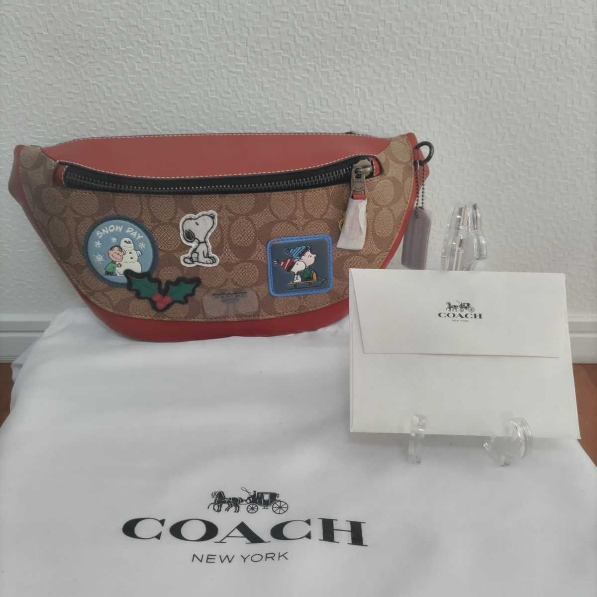 COACH ボディバッグ CE602 QBT04(アイボリー×マルチカラー) スヌーピー