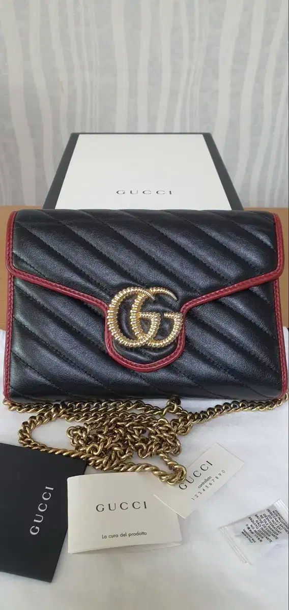 GUCCI(グッチ) マーモント マトラッセ クロスボディバッグ