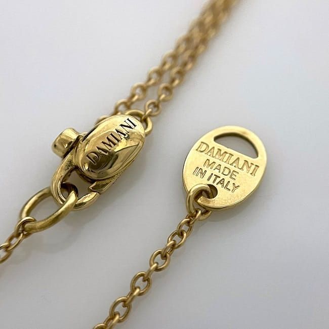 ダミアーニ クロス ネックレス イエローゴールド 美品 750 K18 - メルカリ