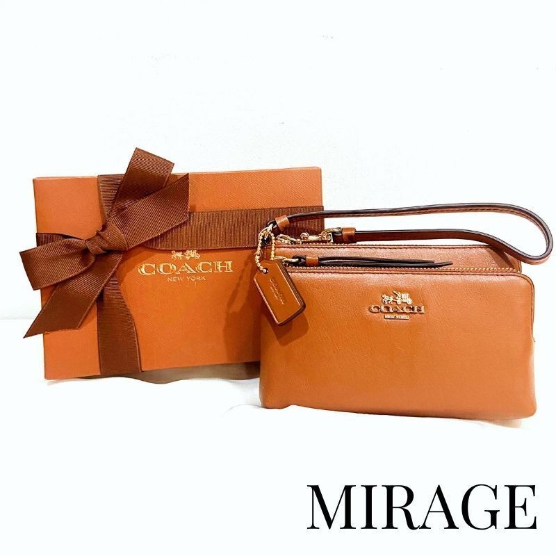 新品 未使用品 COACH コーチ ポーチ ブラウン 茶 箱付き - MIRAGE