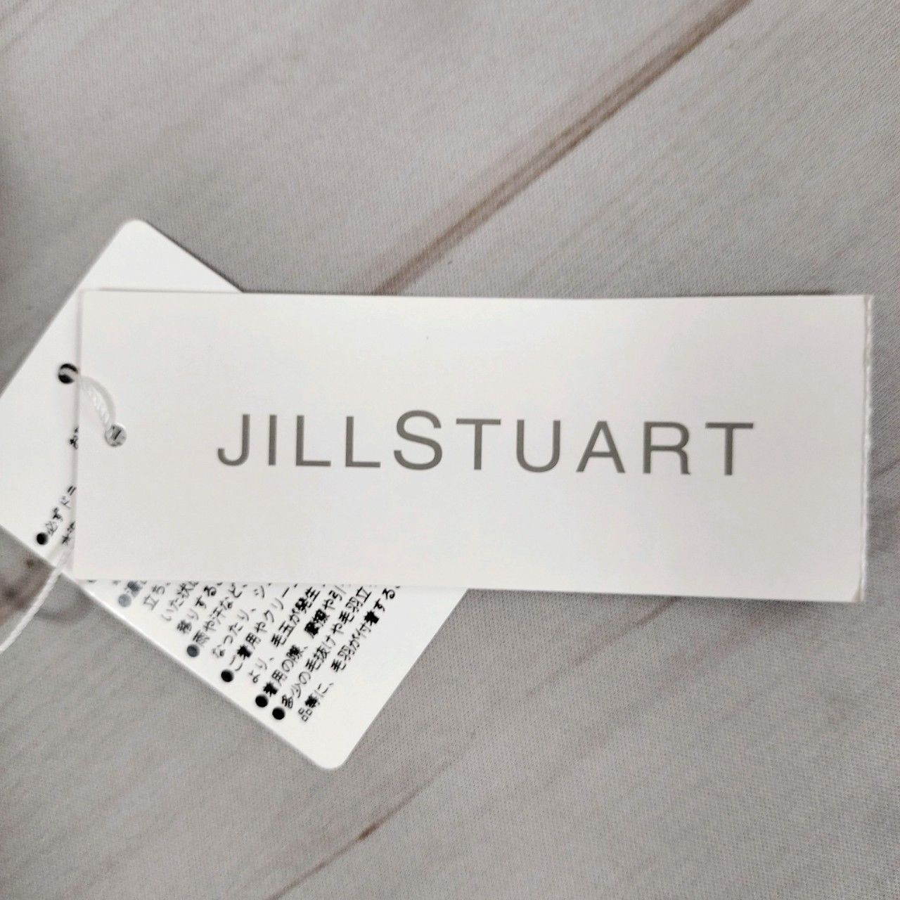 未使用 タグ付き JILL STUART ジルシチュアート レディース ブラウス トップス シャツ 半袖 リボン ボタン 白 シロ Mサイズ【ホワイト M】(671781 bbb250)