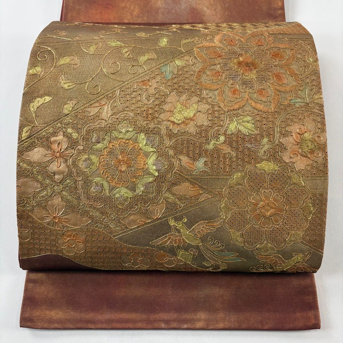 袋帯 秀品 華文 花唐草 金糸 金彩 赤茶 お太鼓柄 正絹