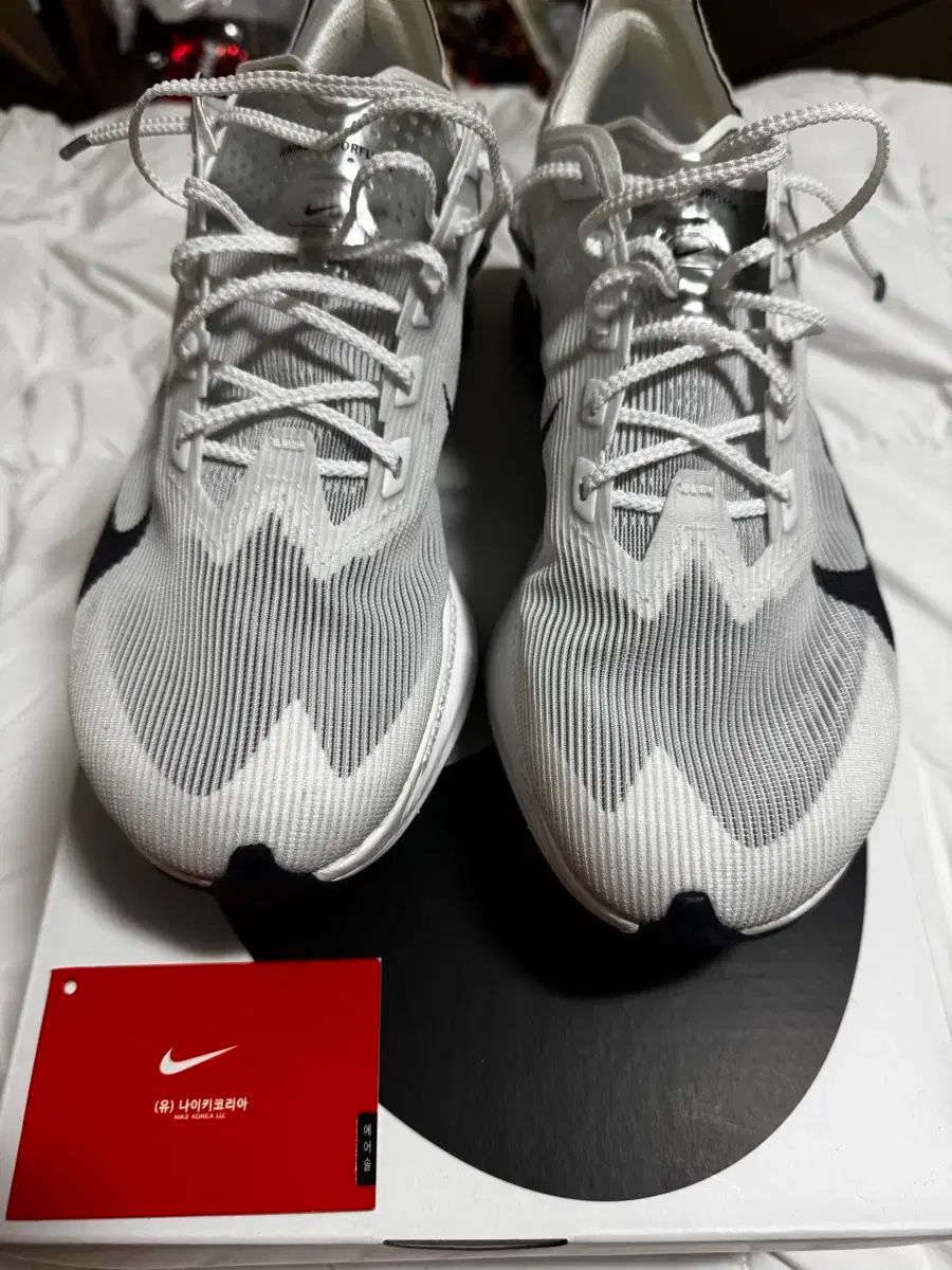 ナイキ ズームX ヴェイパーフライ ネクスト% 4 白 グリッドアイアン