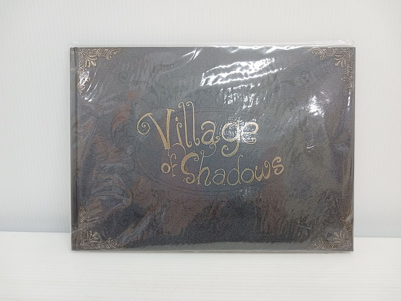 CAPCOM / カプコン バイオハザード ヴィレッジ Art book Village of Shadows アートブック 1534977 中古  [MB-1795] - メルカリ