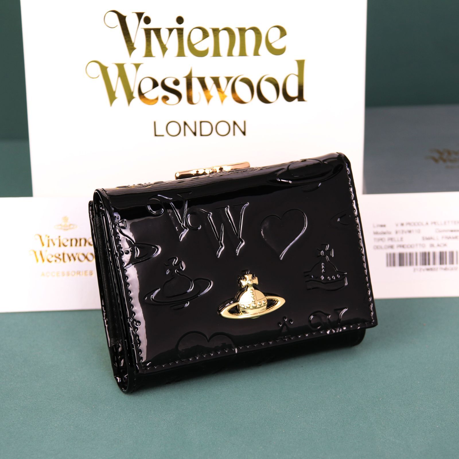 Vivienne Westwoodエナメル13VV110 三つ折り財布　袋箱付き 13vv110 新品/未使用 Vivienne Westwood 三つ折り財布 がま口