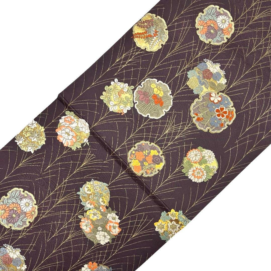 袋帯 雪輪に四季の花模様 紫烏色 金糸 O-4340 - メルカリ 