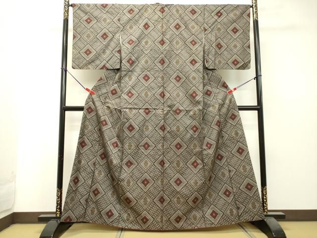 平和屋着物○希少 本場大島紬 龍郷絣 花菱文 池田香智子作 反端付き  