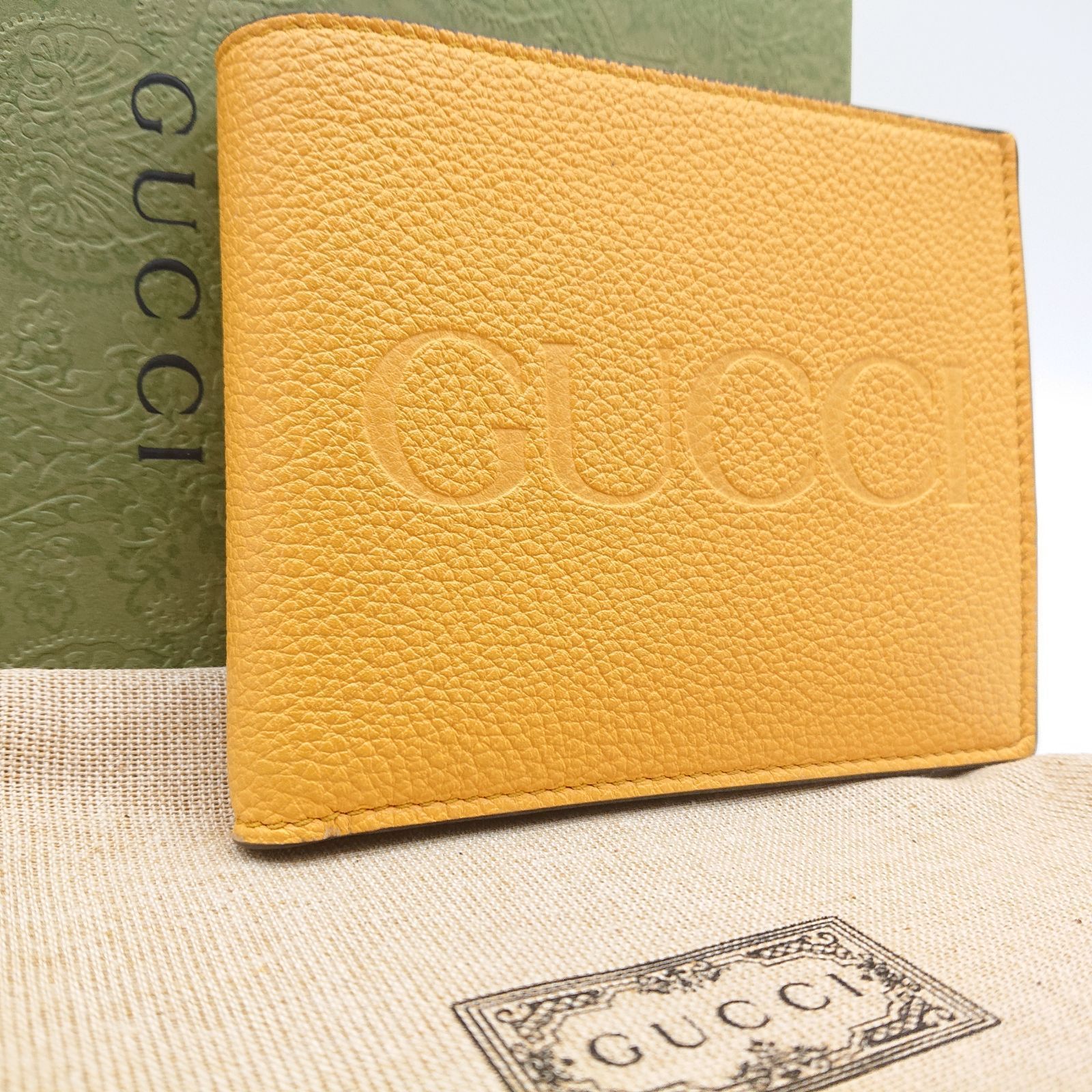 入手困難！GUCCI GGエンボス 二つ折り財布 イエロー