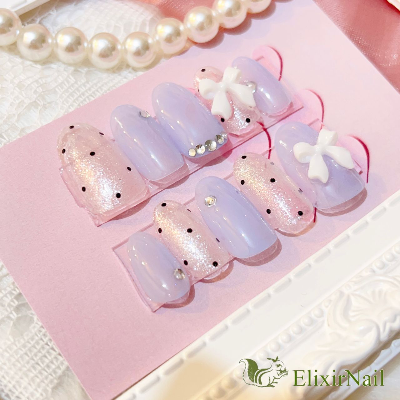 現品】ネイルチップ 水色 リボン ドット - メルカリ