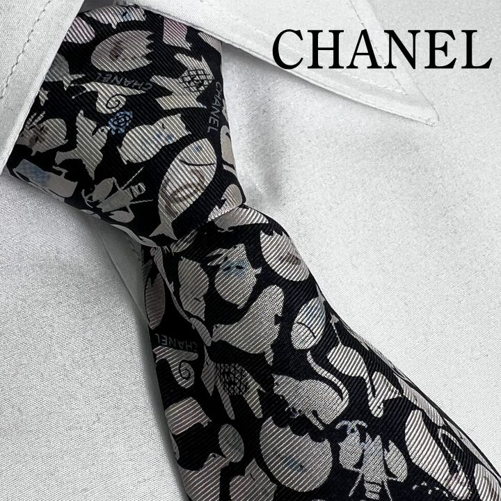 CHANEL ネクタイ　アニマル柄 訳アリ》CHANEL (シャネル) シルクネクタイ 動物柄 - メルカリ