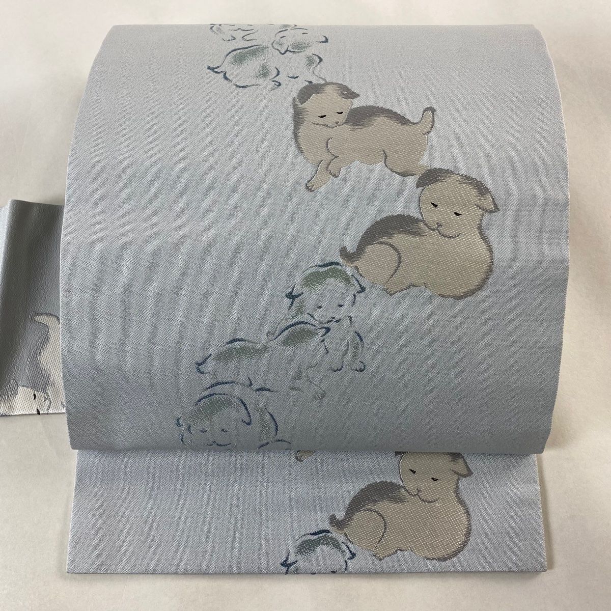 名古屋帯 子犬 シルエット 水色 正絹