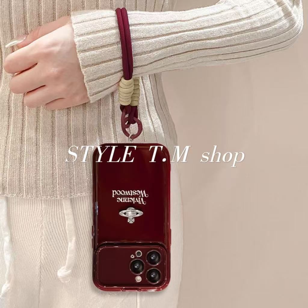 Vivienne Westwood のミラー内蔵携帯ケース、ストラップ付き携帯