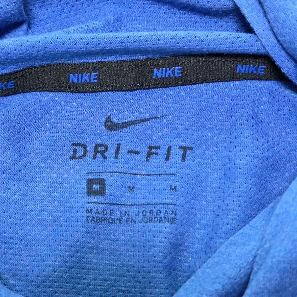 ナイキ フード付きTシャツ