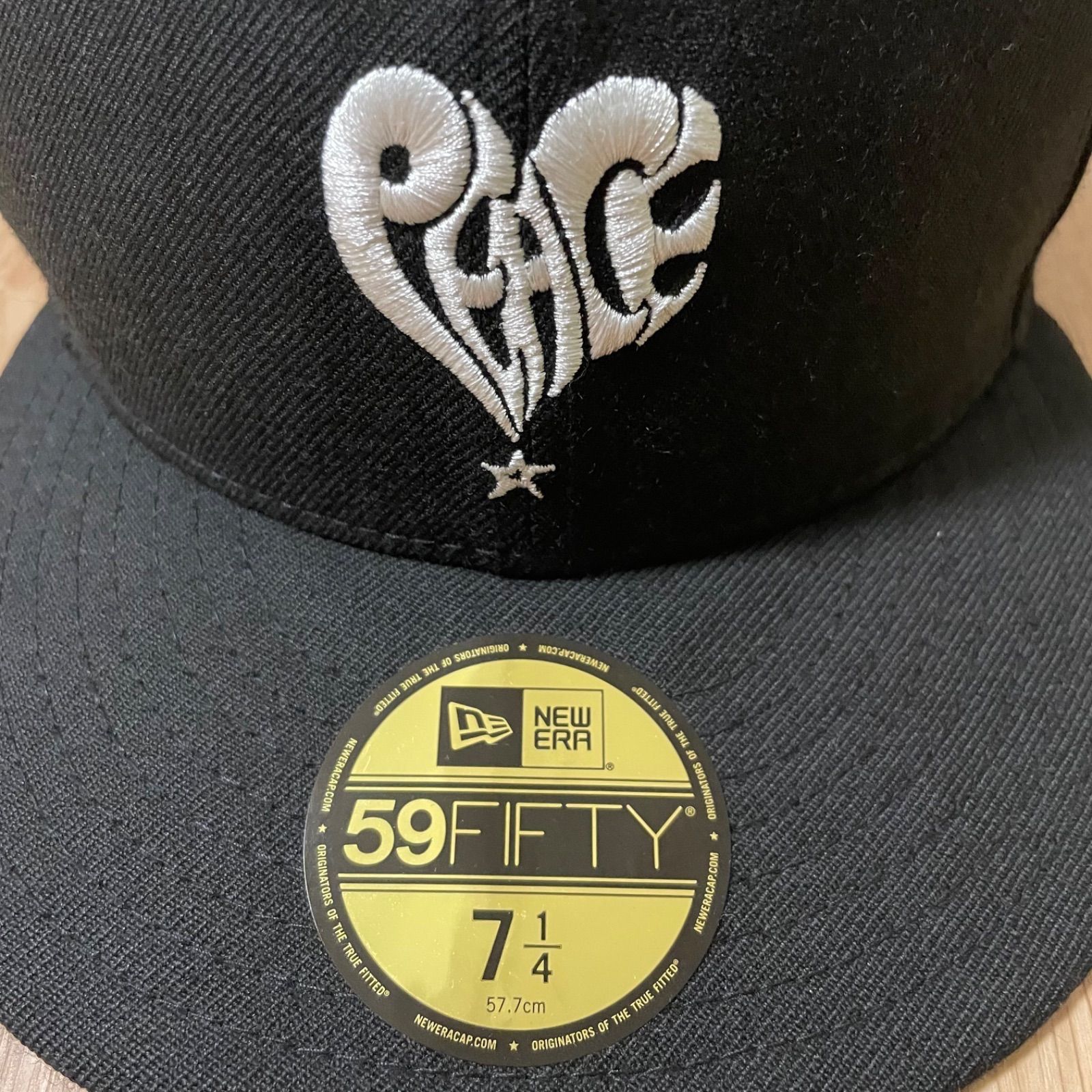 STUSSY PEACE NEW ERA CAP 57.7cm - メルカリ